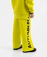 Брюки трикотажные прямой свободной формы с лампасами жёлтые для девочки