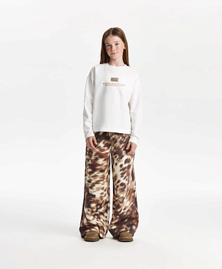 Брюки трикотажные для девочки прямые широкие с принтом